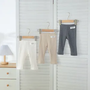 Infant ribbed leggings set for spring and autumn, soft and comfortable baby pants in solid colors.