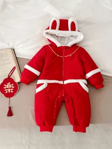 Red baby winter snowsuit with cute bunny ears hood, thick warm cotton onesie for festive New Year.