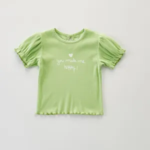 Camiseta canalé manga corta niña, bonito cuello volante, detalle top verano niño.