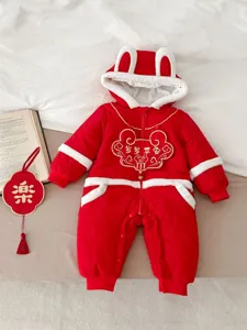Red baby winter jumpsuit with cute rabbit ears hood and festive embroidery details.