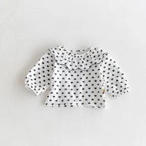 Cute baby toddler girl long sleeve blouse with black heart print and lovely ruffled collar.