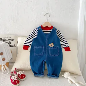 Cute baby denim overalls set with striped long sleeve shirt for autumn toddlers.