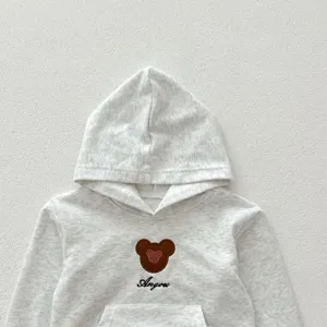 Baby cotton hooded sweatshirt detail with cute bear embroidery and pocket for autumn.
