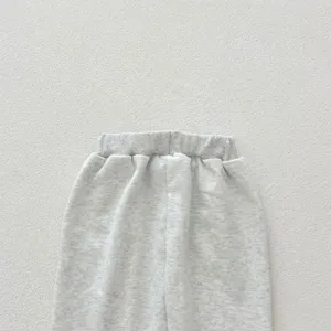 Infant baby cotton pants detail shot, soft heather gray fabric with elastic waistband.