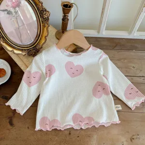 Infant baby girls long sleeve ribbed cotton t-shirt with cute pink smiley heart print top.