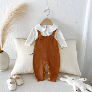 Infant baby knit overall set detail, white collared top and caramel romper display.