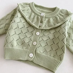Baby girl knit cardigan detail, light green hollow out sweater with large ruffle collar.