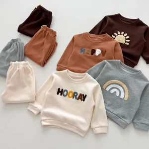 Cute kids autumn letter embroidery sweatshirt and casual pants two-piece set detail view.