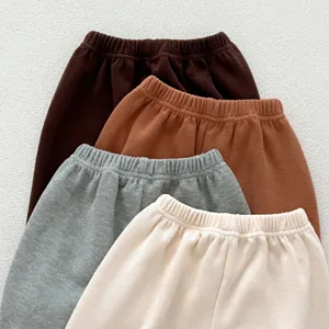Children casual ribbed pants detailing shot, multi-color stacked autumn kids bottom wear display