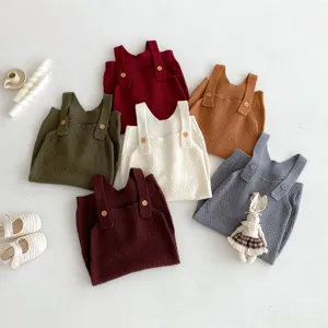 Detailed shot of cute baby knitted romper sets in multiple colors, soft and comfortable daily wear.