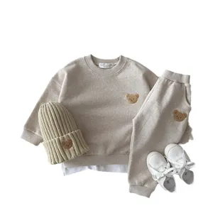 Cozy cotton baby bear sweatshirt set with matching pants and hat for infants and toddlers.