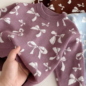 Toddler girls knitted sweater detail, cute bow jacquard pattern, soft cotton long sleeve top.