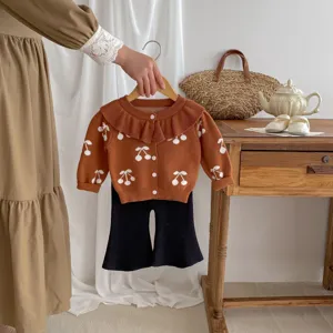 Infant toddler girl knit cardigan detail, cute white cherry print, lapel collar design.