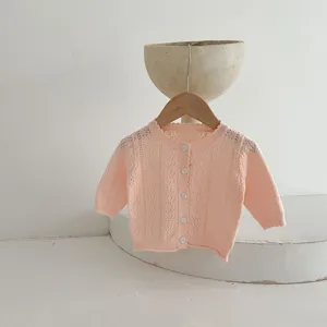 Cardigan di maglia rosa per neonato dettaglio, leggero, traspirante, cotone.