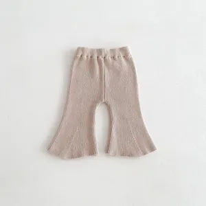Infant knit flare pants detail view, soft ribbed cotton material, comfortable elastic waist.