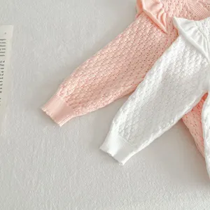 Cute toddler girls knit cardigan sweater with delicate ruffle collar and breathable design.