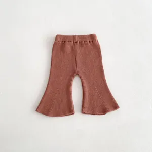 Detail shot of baby knitted flare pants featuring a ribbed texture and comfortable elastic waist.