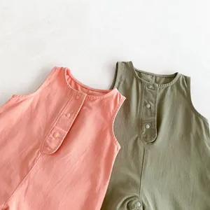 Infant baby sleeveless romper jumpsuit detailed view showing soft cotton fabric and buttons.