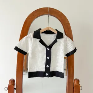 Infant knit cardigan top featuring short sleeves, fine-knit hollow design, and contrast collar.