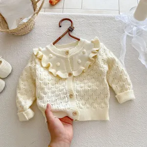 Baby girl knit cardigan, sweet ruffled collar and hollow design for autumn and spring wear.