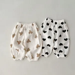 Infant gauze anti-mosquito pants detail, soft cotton baby trousers with cute bear heart prints.
