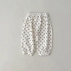 Detail shot of baby gauze anti-mosquito pants featuring soft fabric and elastic waist.