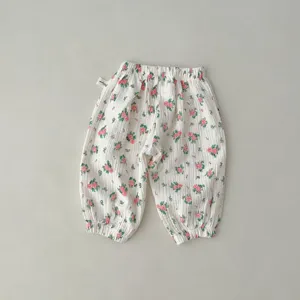 Infant floral gauze trousers detail, soft breathable cotton anti-mosquito baby pants close-up