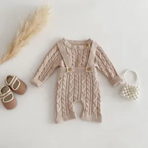 Baby cable knit romper detail, soft cotton autumn long sleeve jumpsuit with cute decorative buttons.