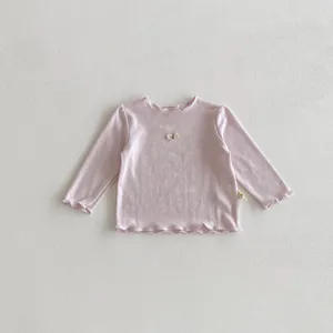 Süßes Baby Rosa Langarmshirt mit Rüschen und Schleife für kleine Mädchen im Alltag.