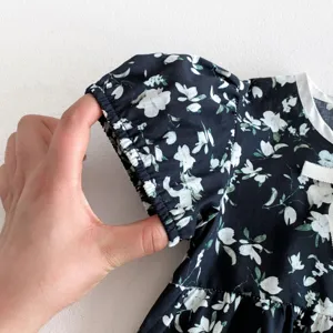 Sommerliches Blumen-Kurzarm-Puppenhemd für kleine Mädchen, süßes Baby-Oberteil mit Schleife, Alltag.