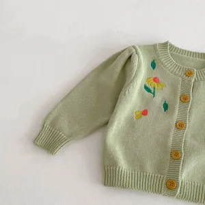 Baby light green knit cardigan with cute floral embroidery and yellow buttons for daily wear.