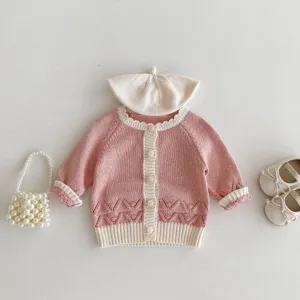 Toddler girls pink knit cardigan set featuring matching beret, shoes, and pearl bag details.