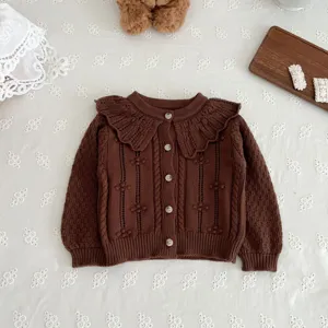 Brown baby knitted cardigan with cute doll collar. Soft cotton toddler sweater for girls.