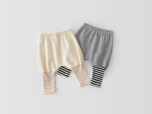 Cute baby harem pants with striped cuffs, soft cotton toddler trousers for spring everyday wear.