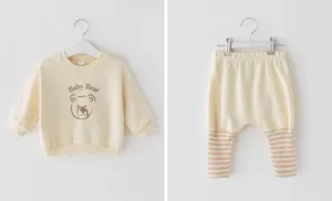 Cute baby sweatshirt and harem pants set, bear graphic detail, stylish toddler outfit.