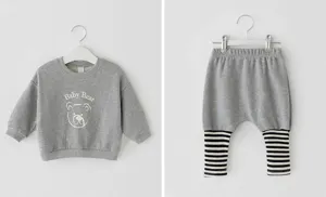 Detail view of toddler grey sweatshirt and harem pants set with cute bear print and striped cuffs.