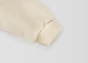 Kids sweatshirt knit cuff detail view, soft cotton blend fabric, casual children apparel