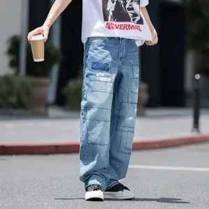 Ανδρικό τζιν παντελόνι φαρδύ ίσιο casual, vintage ξεβαμμένο μπλε με στυλάτες πιτσιλιές μπογιάς.