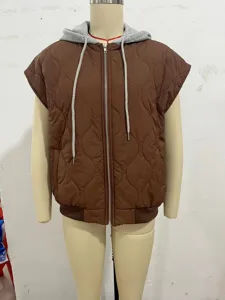 Women's brown quilted sleeveless hooded vest jacket with grey adjustable drawstring.