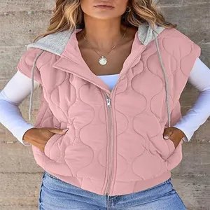 Trendy women's pink quilted hooded sleeveless vest outerwear for casual autumn style.
