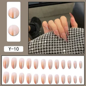 Detailed view of gradient cat-eye press-on nails showing delicate blush design and texture.