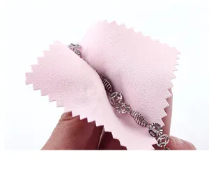 Silver polishing cloth detail view, pink velvet jewelry cleaner for silver items and chains.