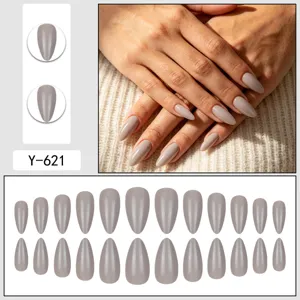 Detailed view of glossy silver grey almond press-on fake nails showing fine finish and shape.