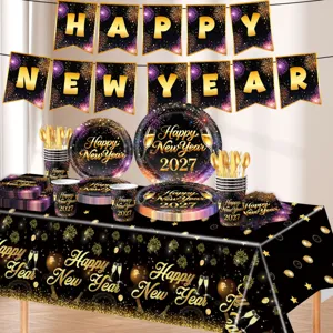 Black gold New Year party decoration set with tableware, plates, cups and tablecloth.