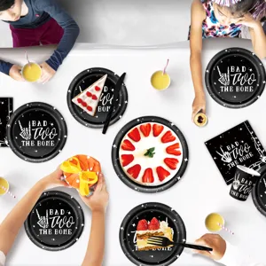 Bad Two The Bone 2nd birthday party tableware set with skeleton plates cups and napkins.