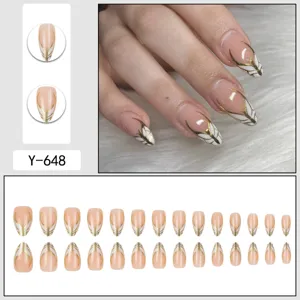Short almond press-on nails with elegant gold lines and white French design for women.