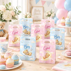 Baby shower party favor gift bags with cute sleeping teddy bear design in pink and blue scene.