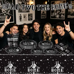 Bad Two The Bone birthday party tableware set with skull paper plates, cups and table cloth.