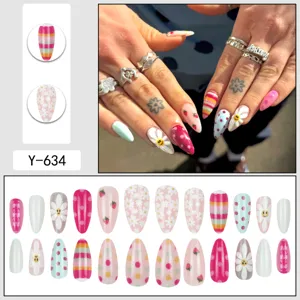 Almond press-on nails summer sweet pink floral smiley polka dot false nail set detail view