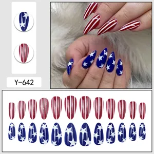 Detailed view of American flag press-on fake nails, featuring red white stripes and star designs.